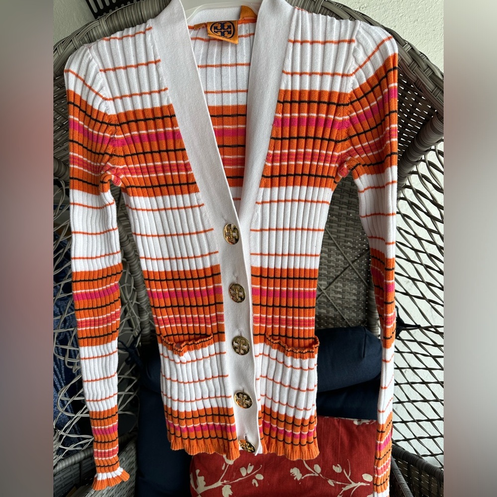 Tory Burch sweater in good condition. Buttons are loose.